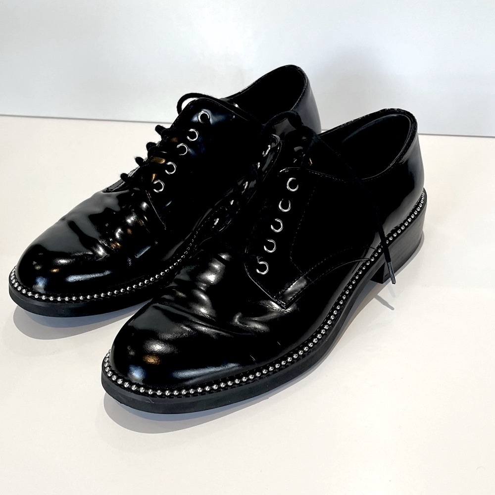 Elegant Black womens Oxfords with Silver Accents.